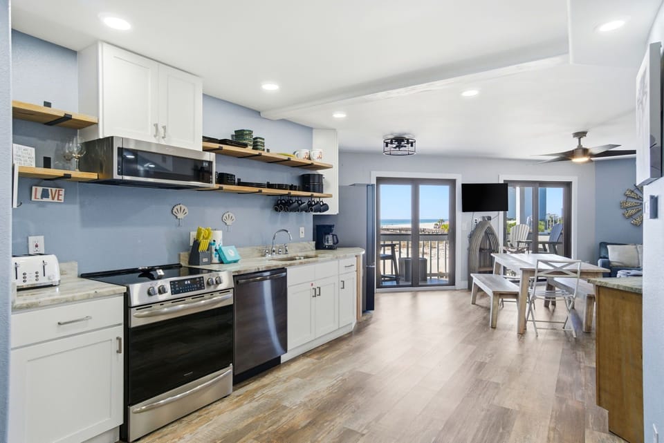 Regatta Condo 201A-  Kitchen View to Dining & Balcony