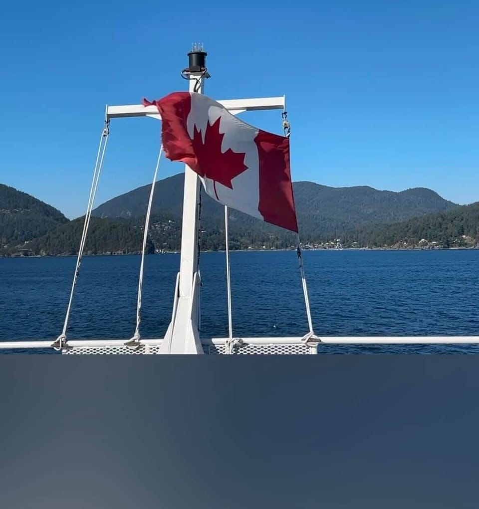 View from top deck of ferry, Bowen Island in distance