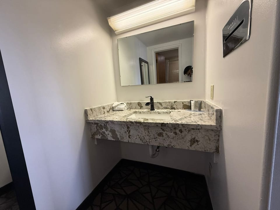 Room, 2 Queen Beds, Non Smoking | Bathroom | Combined shower/tub, hair dryer, towels