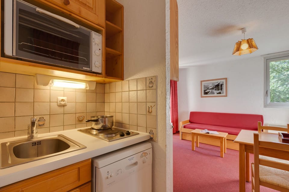 Prepare a meal in the equipped kitchen.