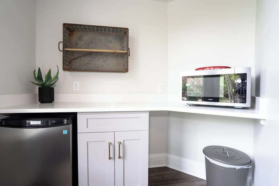 The room has its own dining seat, microwave and mini fridge.