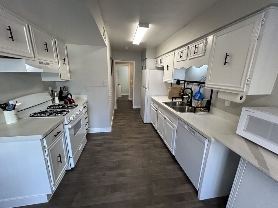 Kitchen to laundry then 1/2 bath
