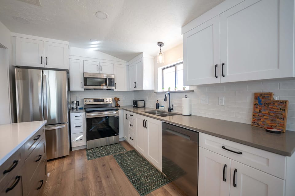 The newly remodeled kitchen has top of the line appliances, ample counter space, and all the essentials you need to feel right at home.