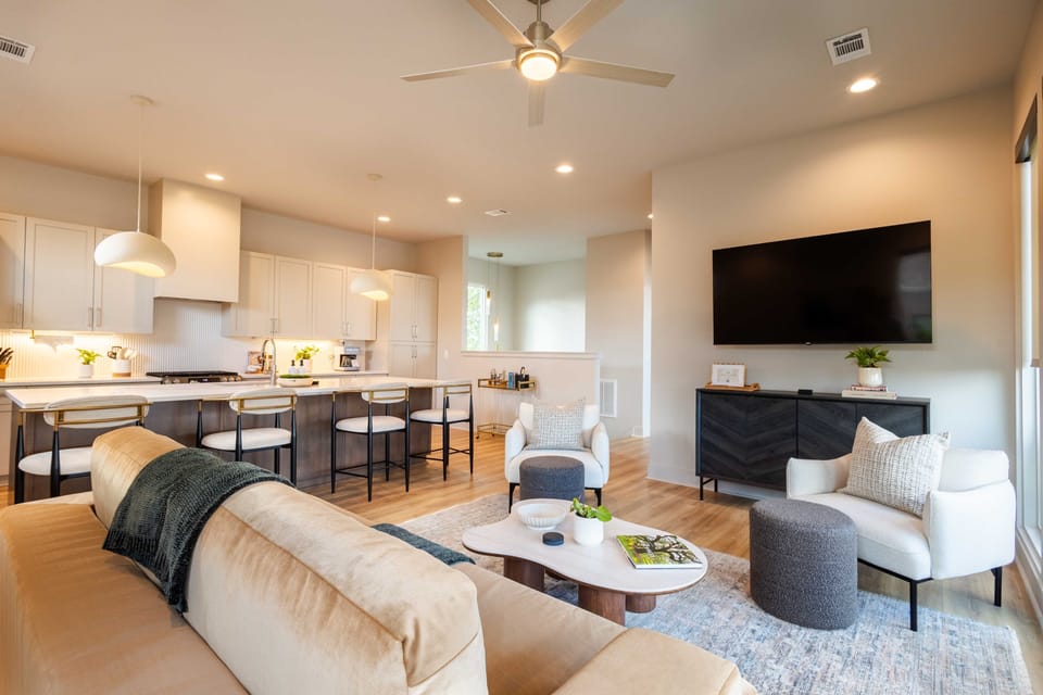 Spacious open-concept living designed for gathering, entertaining, and connection.