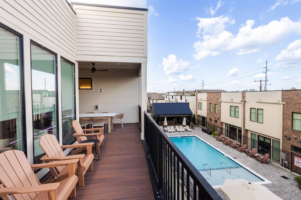 Private rooftop terrace overlooking the heated pool and courtyard below.