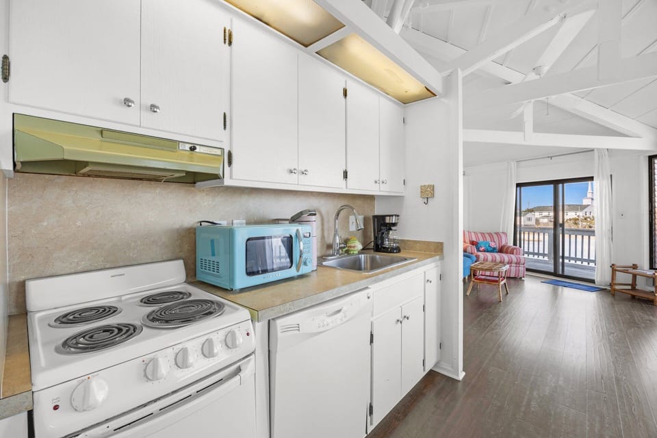 The fully equipped kitchen makes preparing meals easy and convenient, with everything you need for casual vacation cooking.