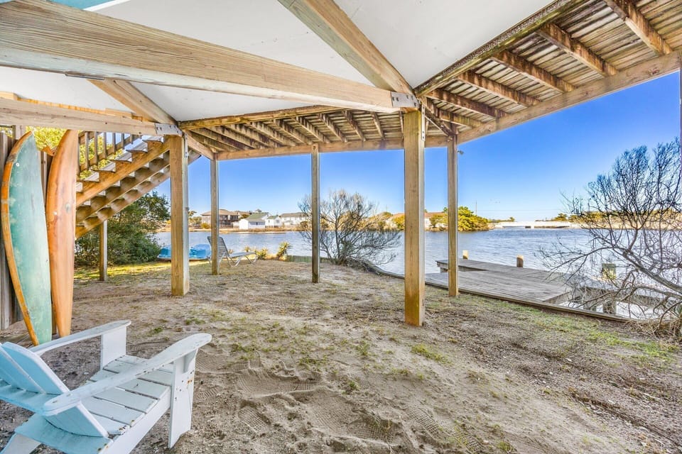 Ozzie's Island Hideaway sits right on the canal, offering serene water views and easy access for kayaking, paddleboarding, or simply relaxing by the water.