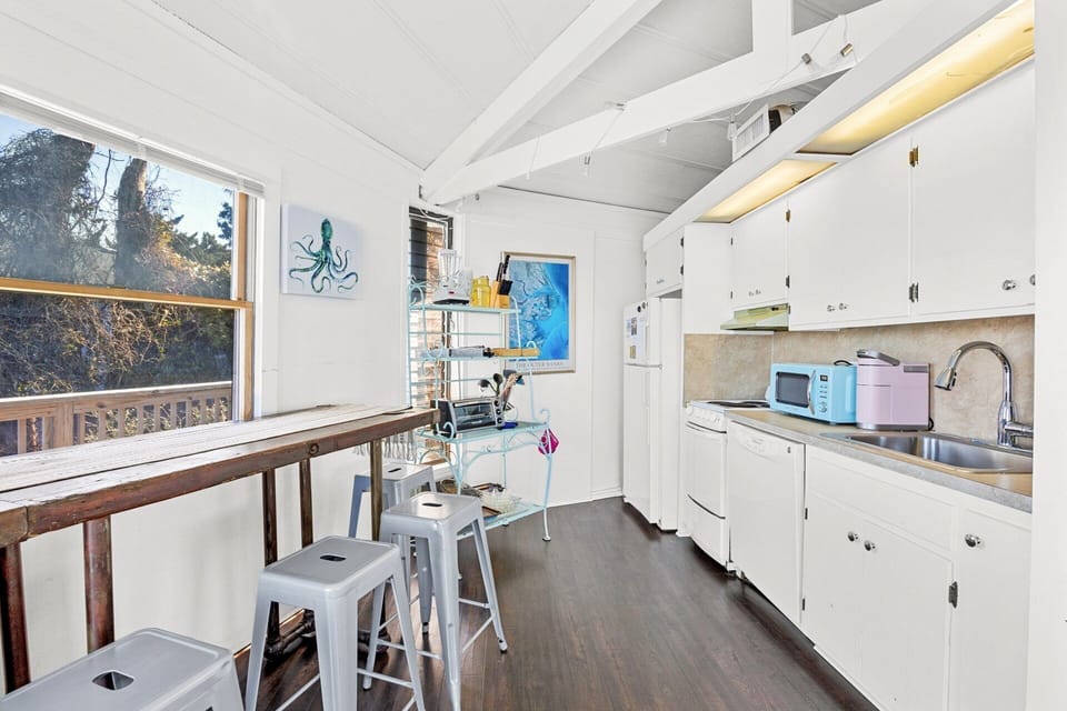The fully equipped kitchen makes preparing meals easy and convenient, with everything you need for casual vacation cooking.