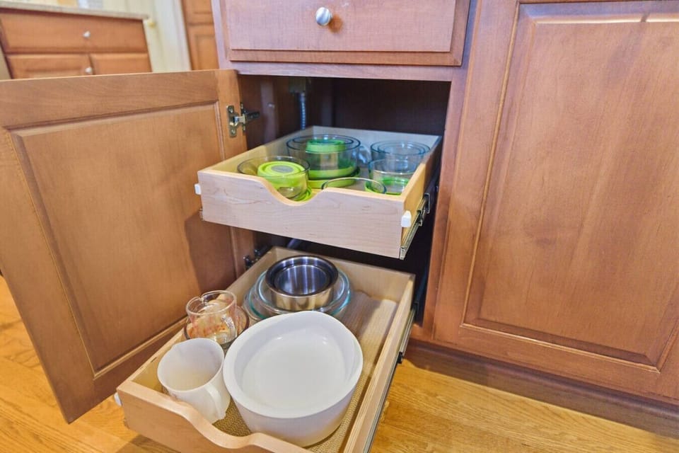 Fully stocked kitchen with everything you need: large double‑door fridge, Keurig + drip coffee, blender, toaster, microwave, dishwasher, and a spacious island. Enjoy snacks on arrival and a window-view sink that makes cooking feel easy.