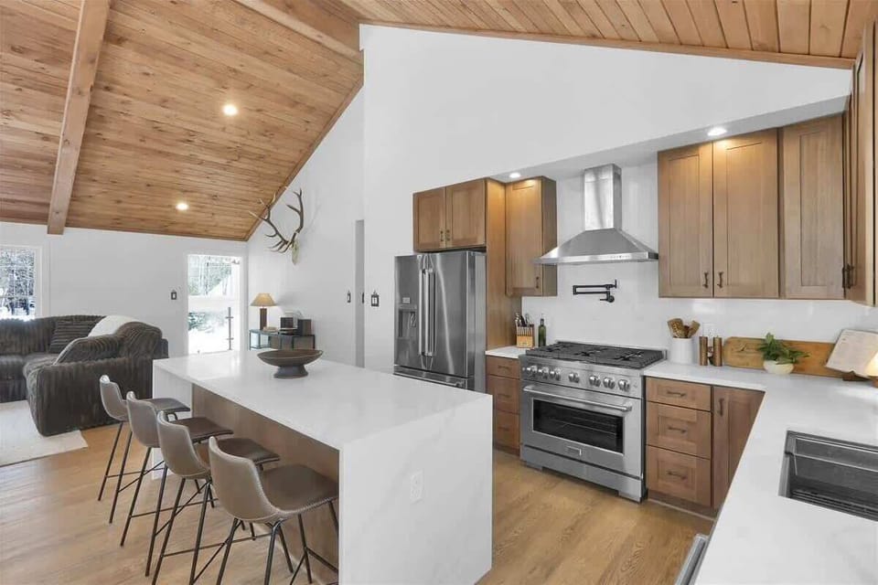 Spacious Kitchen with Breakfast Bar and Dining Area
