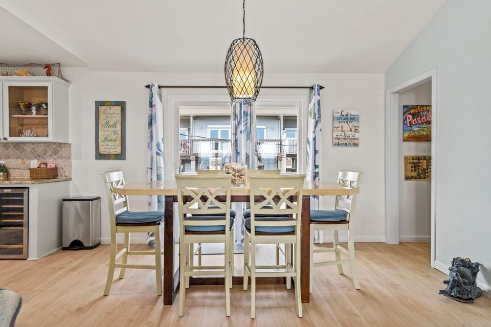 Sunny dining space made for shared meals, laughter, and beachside moments.