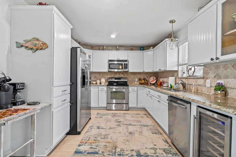 Fully stocked coastal kitchen — perfect for cooking up fresh meals after a day at the beach.