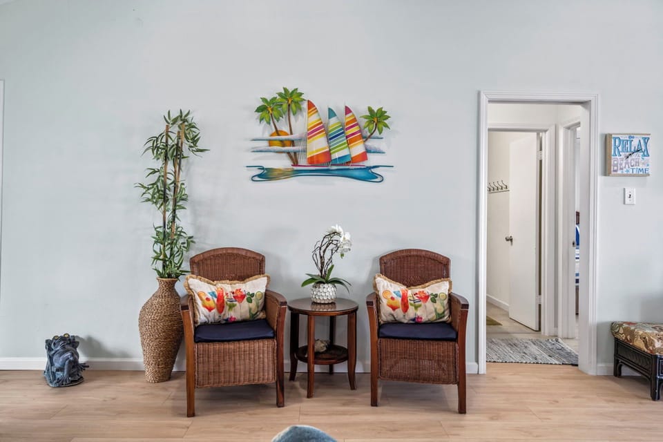 Charming beachy nook with cozy seating — the perfect spot for morning coffee or quiet relaxation.