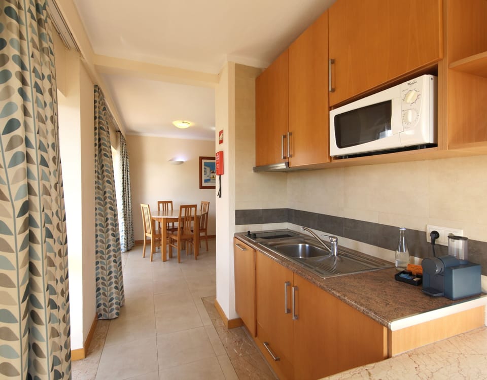 Mini-fridge, microwave, stovetop, dishwasher