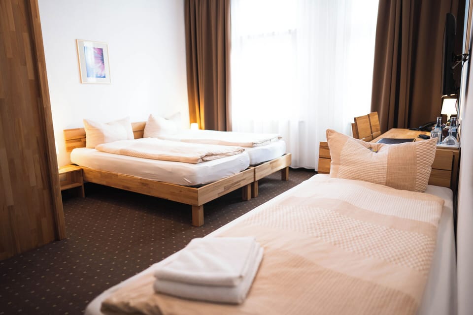 Standard Triple Room | Hypo-allergenic bedding, desk, cribs/infant beds, free WiFi