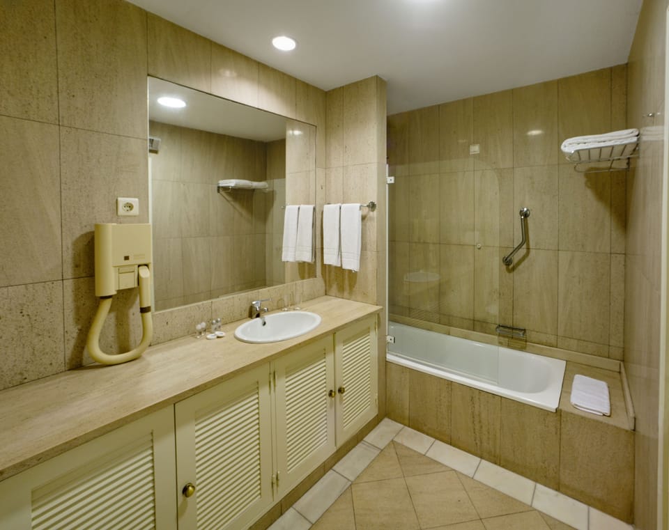 Free toiletries, hair dryer, bidet, towels