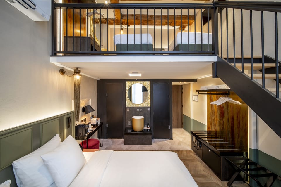 Deluxe Quadruple Room | Minibar, in-room safe, desk, free WiFi