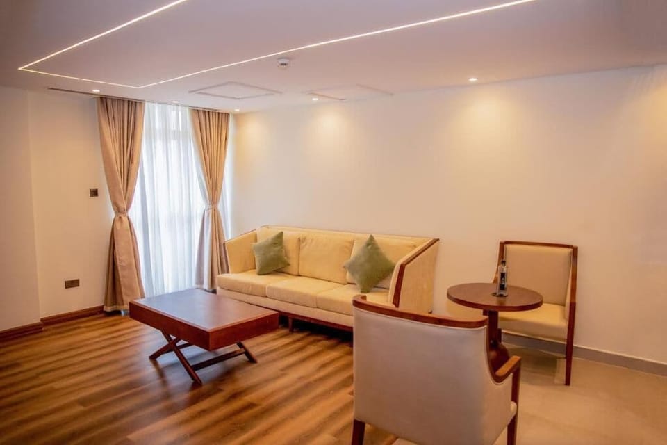 Executive Suite, Balcony, Mountain View | Living area | TV, printers