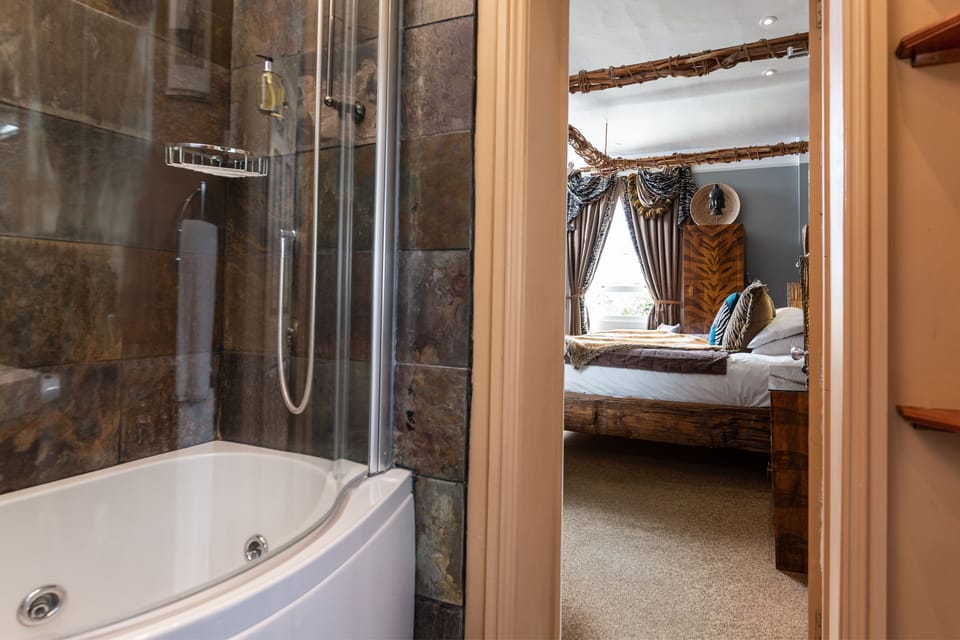 Room (Out of Africa) | Bathroom | Shower, free toiletries, hair dryer, towels