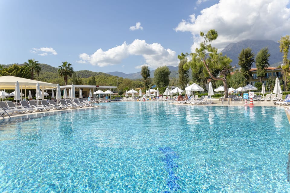 Indoor pool, 3 outdoor pools, open 7:00 AM to 6:00 PM, pool umbrellas