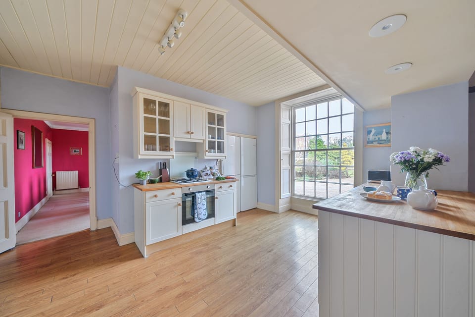 Old Ford House, Blandford: The main kitchen with a front facing view