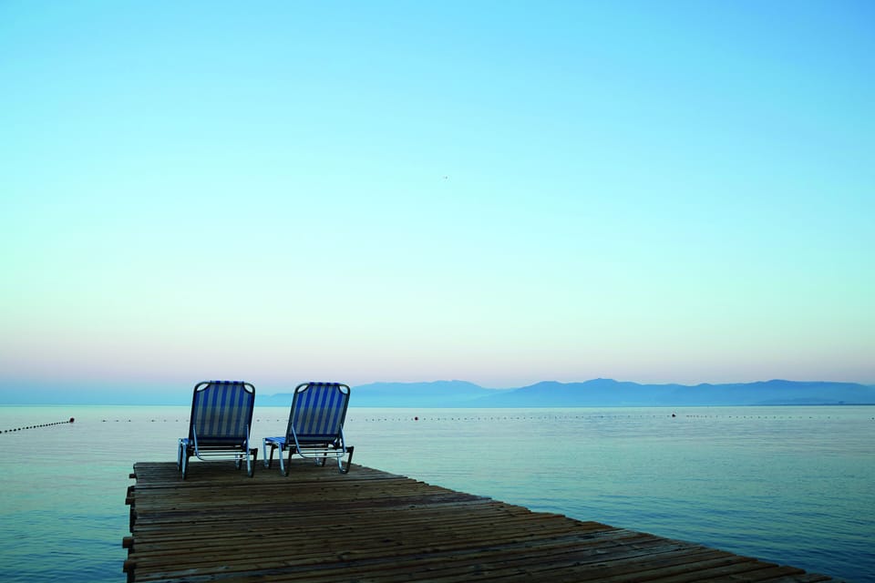 Private beach, free beach shuttle, free beach cabanas, sun loungers