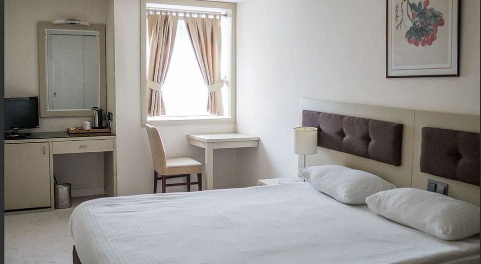 Economy Room, City View | Premium bedding, minibar, laptop workspace, free WiFi
