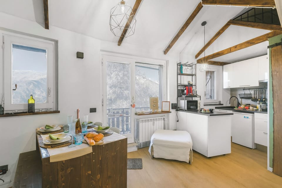 Honeymoon Apartment, Multiple Bedrooms (La Chicchetta) | Private kitchen | Fridge, microwave, stovetop, coffee/tea maker