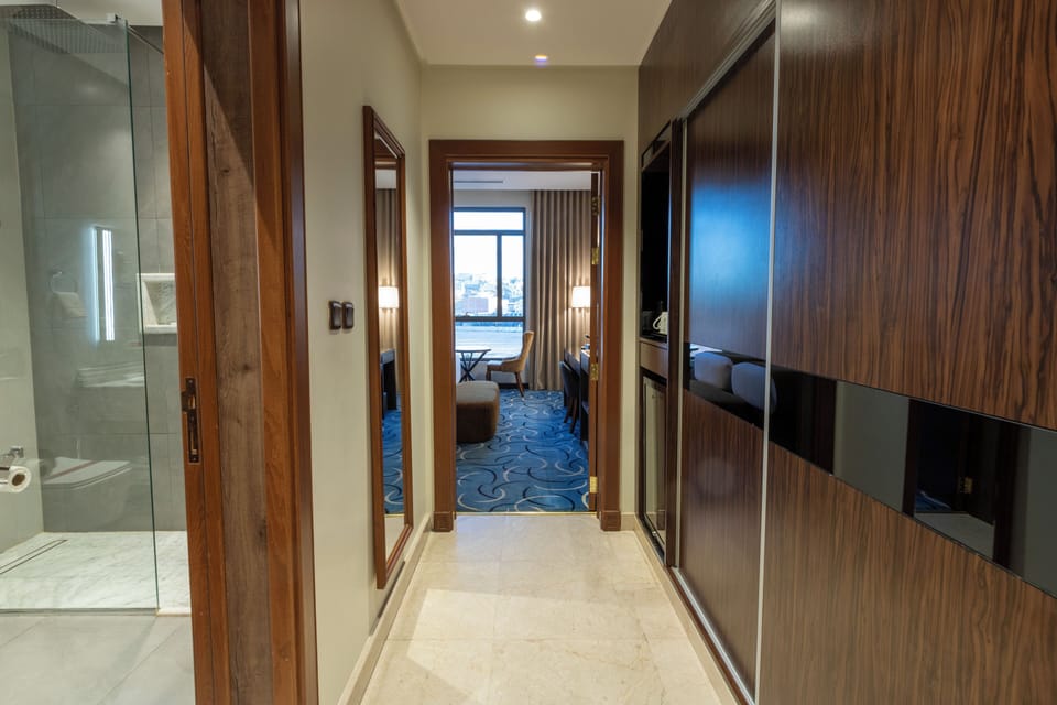 Junior Suite, Courtyard View | In-room safe, soundproofing, iron/ironing board, free WiFi