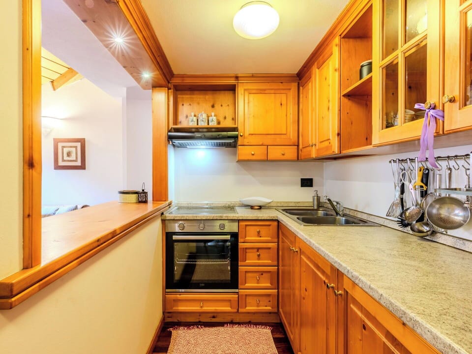 Cabinetry, Kitchen, Interior Design, Ceiling, Flooring, Countertop, Room, Cupboard, Drawer, Wood Stain