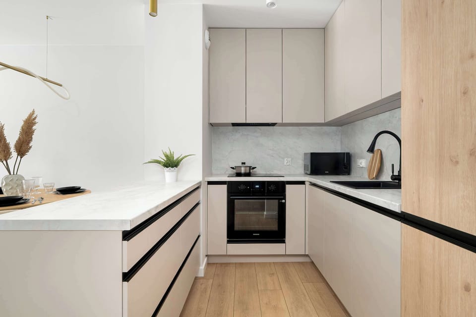 The fully equipped kitchenette includes everything you need for a home-cooked meal.