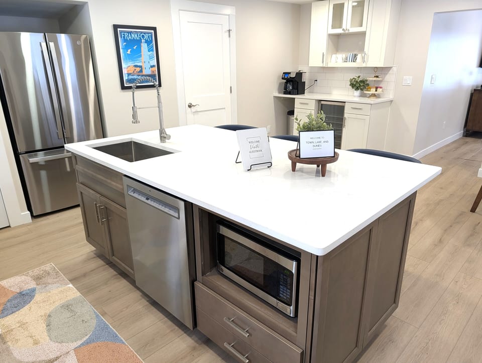 KITCHEN:  The home has a big and beautiful kitchen with all appliances including a dish washer, coffee bar, food pantry, and separate beverage cooler