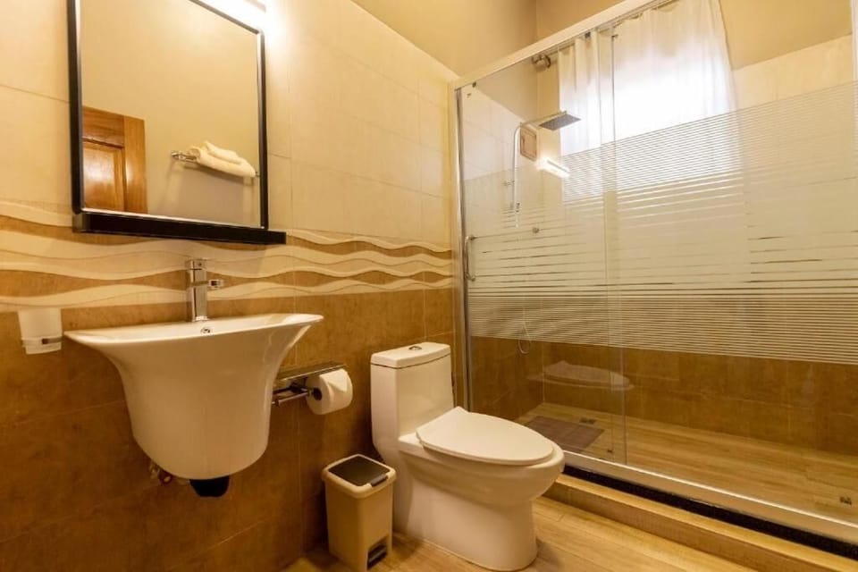 Shower, free toiletries, hair dryer, slippers