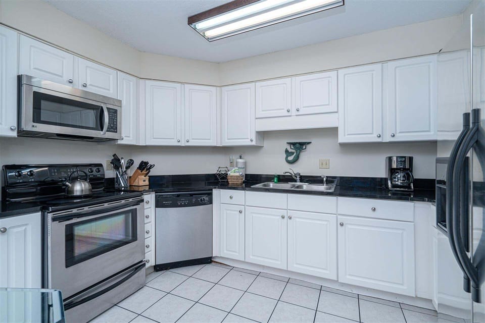 Condo, 2 Bedrooms | Private kitchen | Coffee/tea maker, fridge, oven, toaster