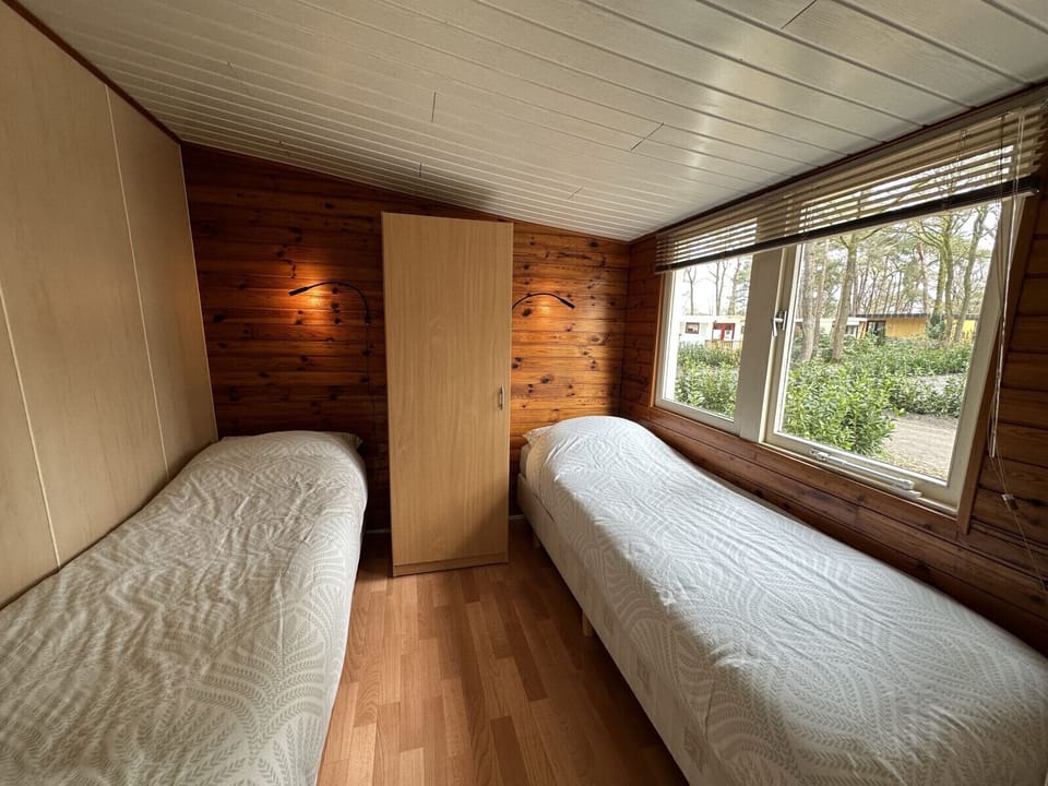 Recreatiepark Klein Zwitserland - Regenboog - bedroom