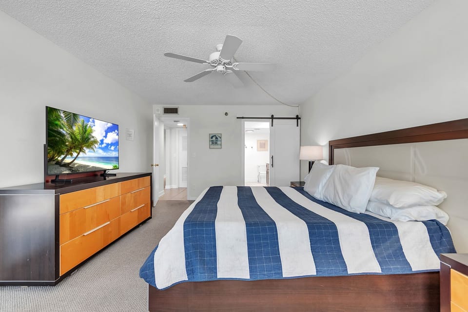 Master Bedroom with King Bed and TV