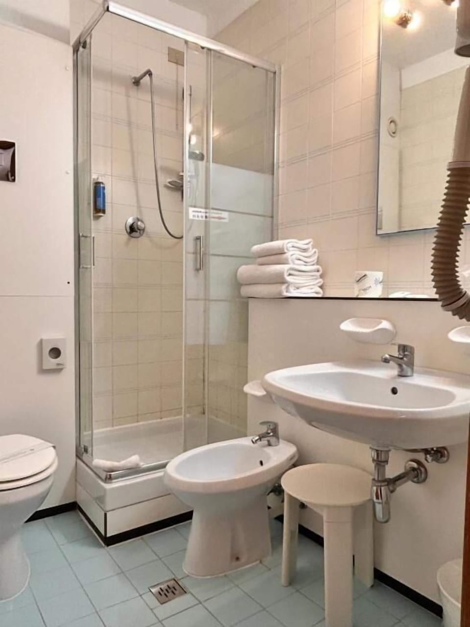 Shower, free toiletries, hair dryer, towels