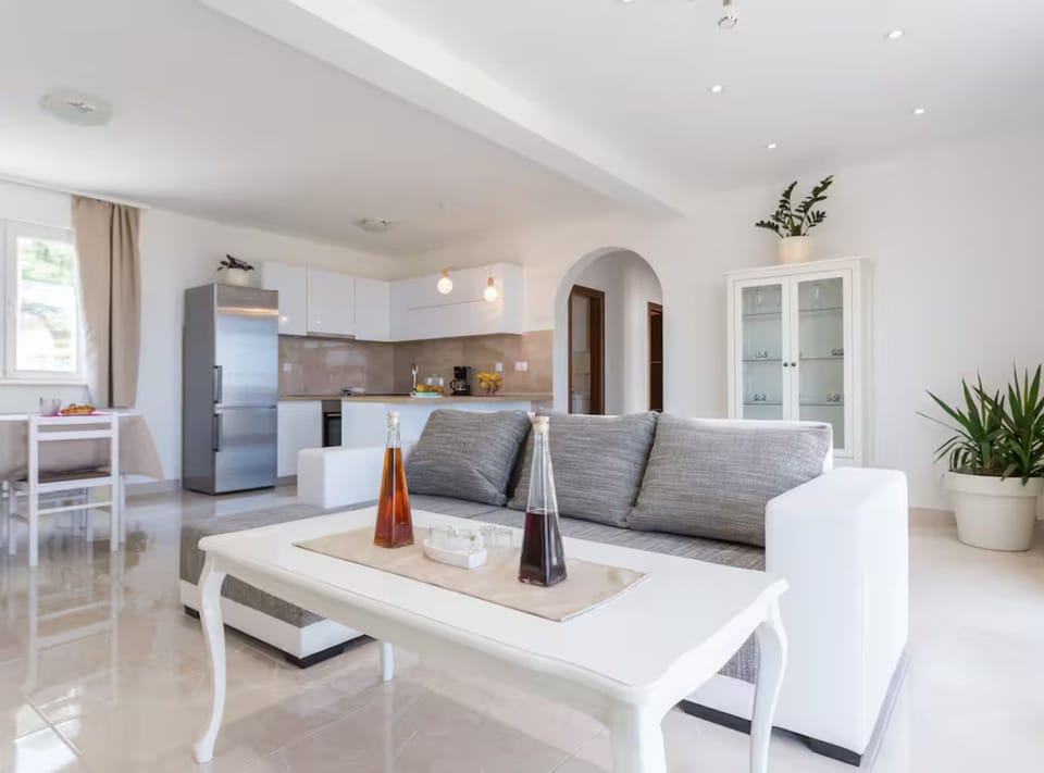 House (Two Bedroom Holiday Home with Terrace) | Living room | 32-inch flat-screen TV with satellite channels