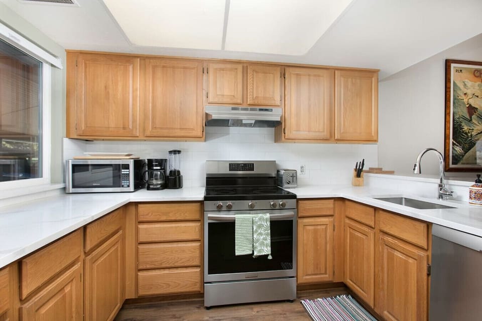 Kitchen with stainless steel appliances and granite countertops