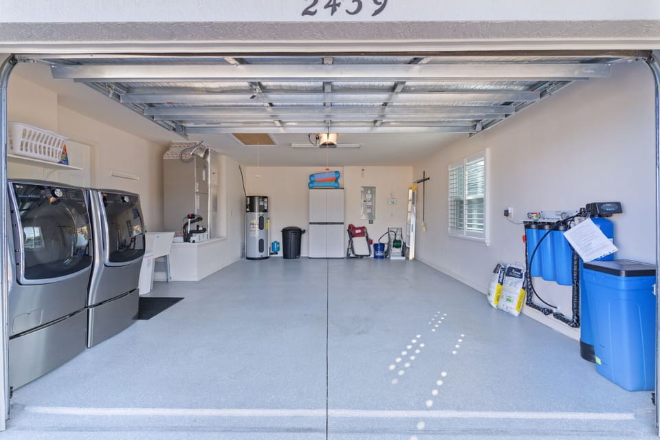 Your organized garage includes convenient laundry facilities with modern washer and dryer for extended stays.