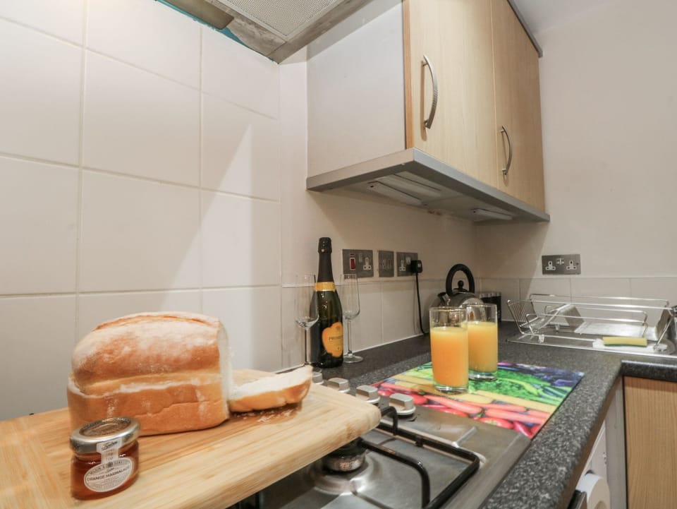 Fridge, microwave, toaster, cookware/dishes/utensils