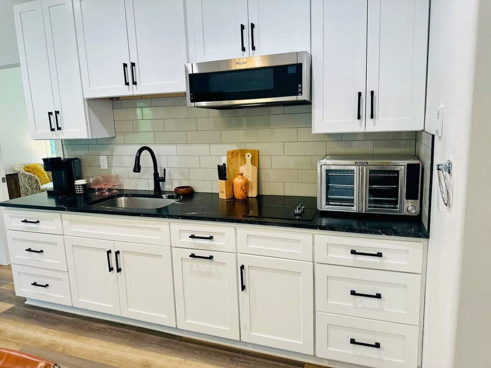 Enjoy the perfect sized, fully stocked kitchen for all of your dining needs,