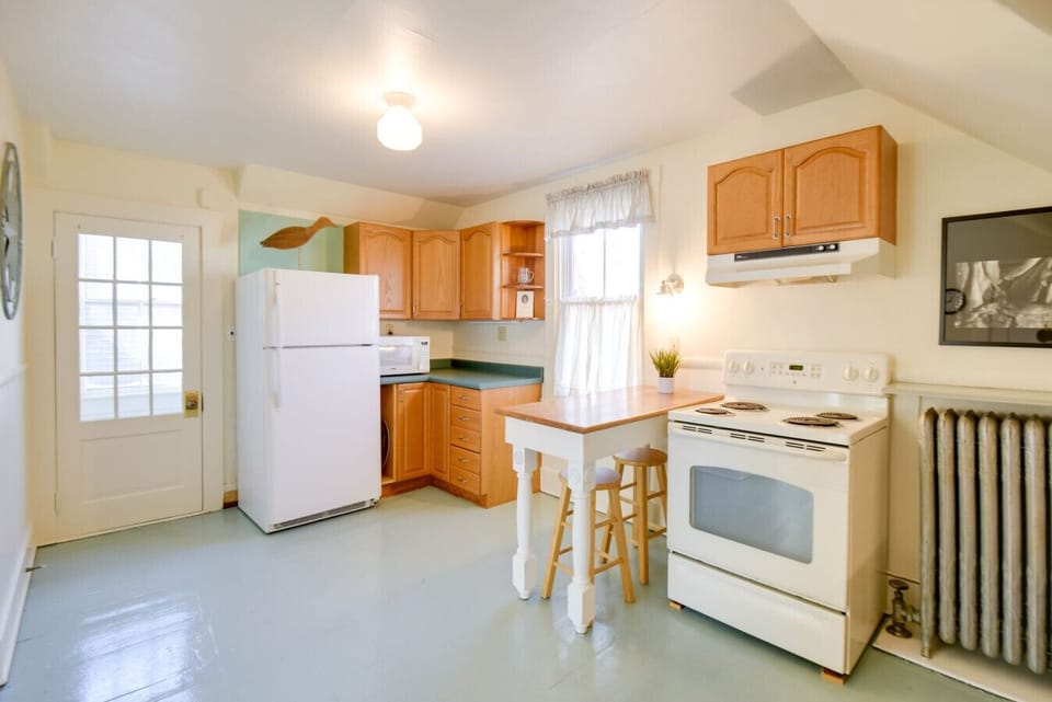 Kitchen Area | Bright Prep Space with Eat-In Table