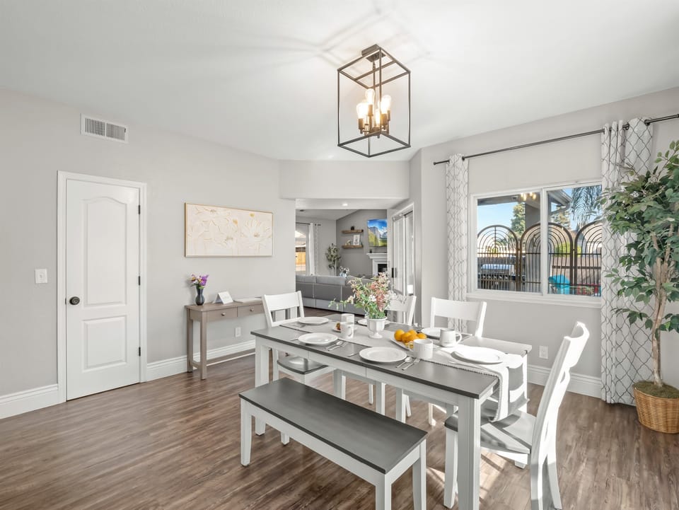 Comfortable dining area with seating for the whole family—perfect for shared meals, game nights, or morning coffee before heading out for the day.