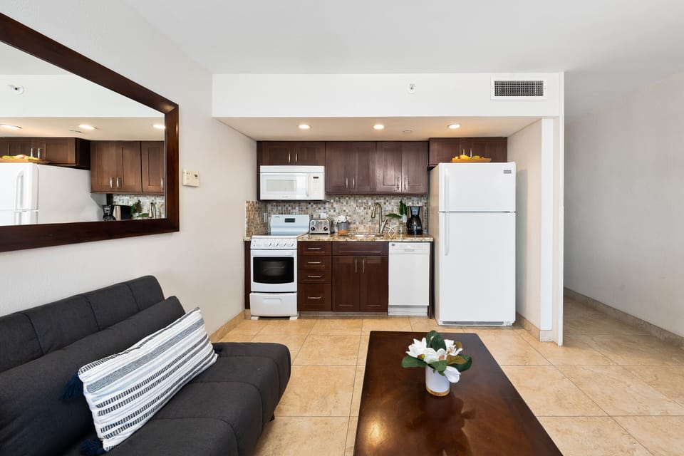 Cozy living space with modern kitchen convenience