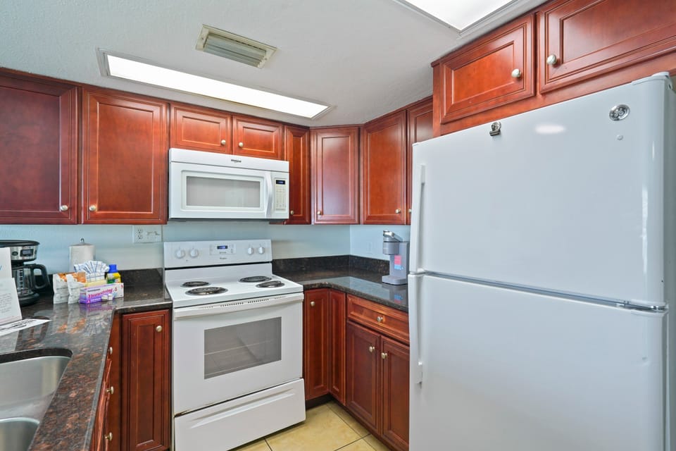 Cabana Club of Destin offers a bright, fully stocked kitchen perfect for Gulf front getaways.