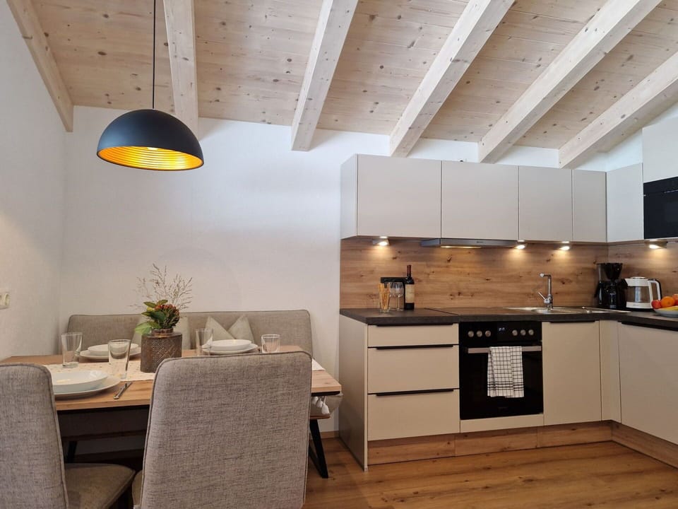Furniture, Interior Design, Flooring, Wood, Ceiling, Floor, Room, Light Fixture, Wood Flooring, Lighting