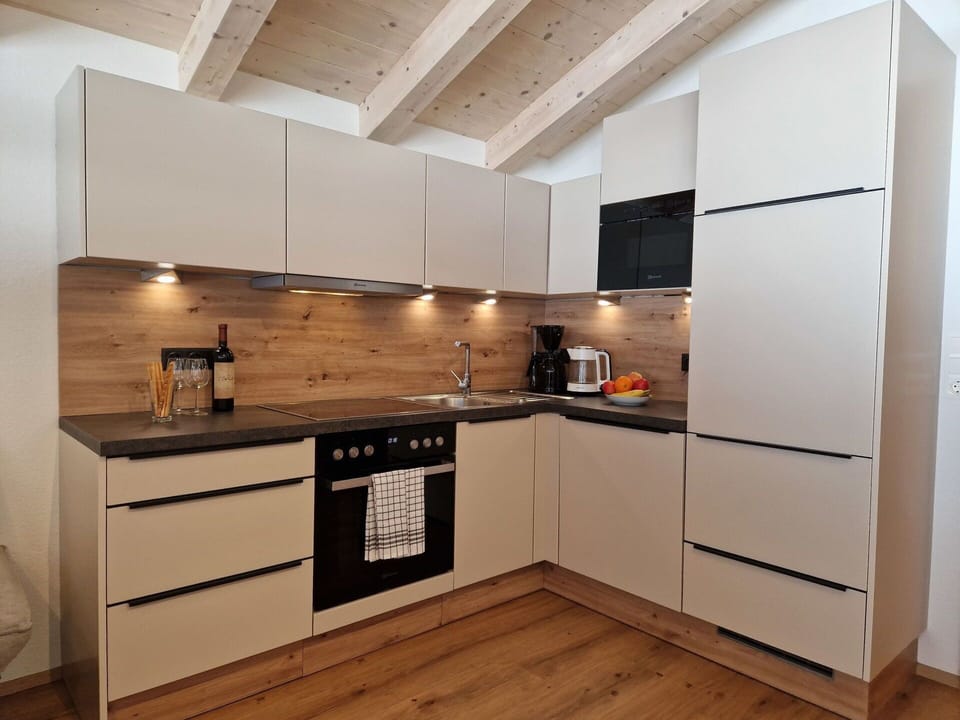 Kitchen, Kitchen Appliance, Countertop, Furniture, Cabinetry, Flooring, Major Appliance, Wood, Interior Design, Home Appliance
