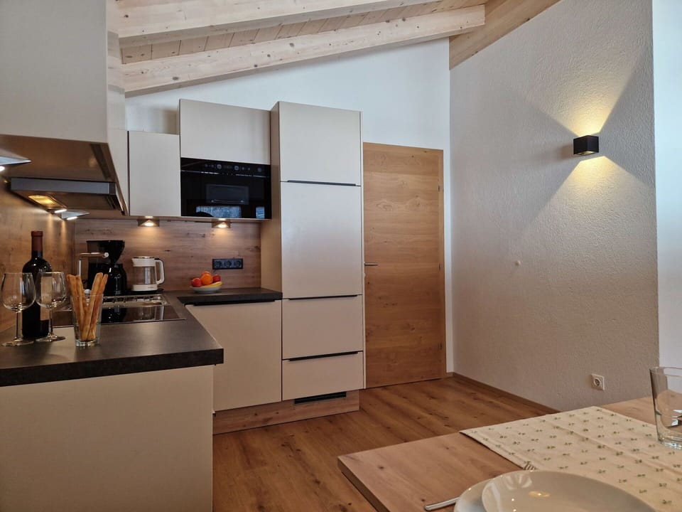 Interior Design, Furniture, Flooring, Light Fixture, Wood, Ceiling, Kitchen, Countertop, Room, Floor