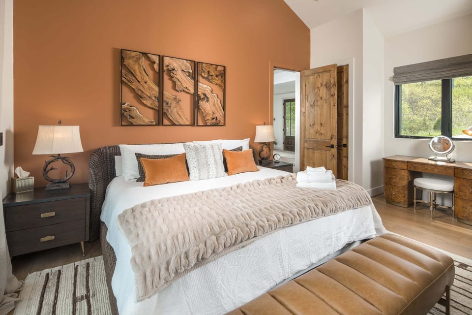 King Suite Bedroom with Private Bathroom and Deck Access